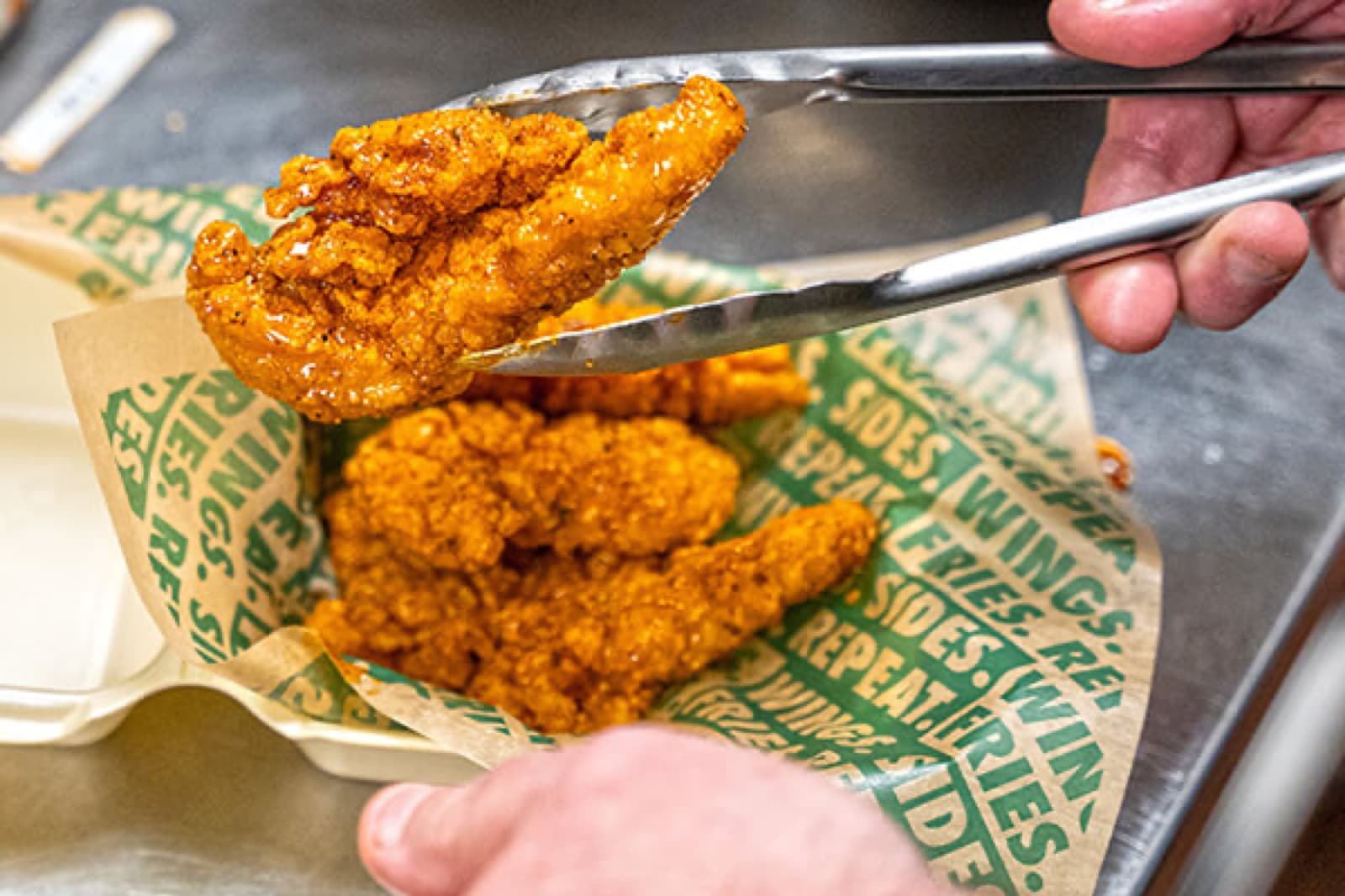 PCR Opens Its Third Wingstop Location In Washington Heights